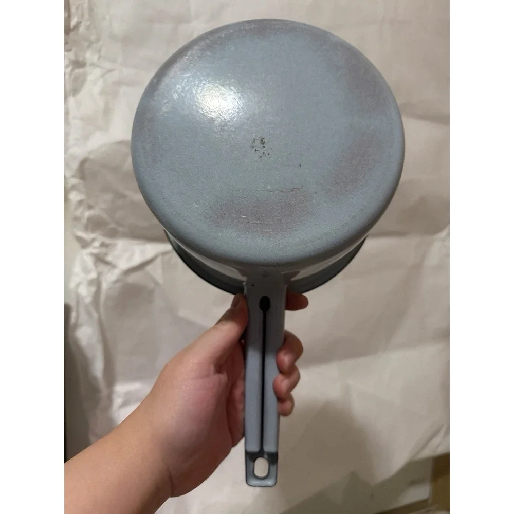 vintage light blue enamelware saucepan